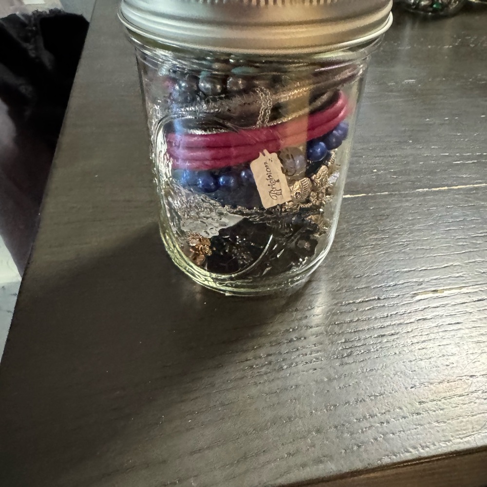 Colorful Beaded Bracelets in Jar